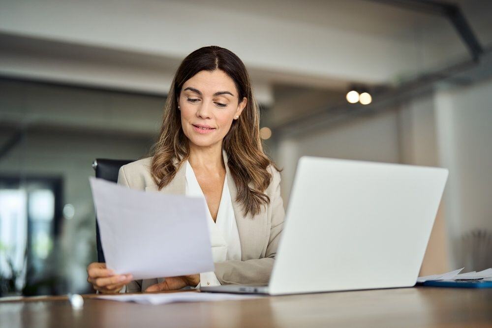 Woman reviewing homeowners insurance glossary