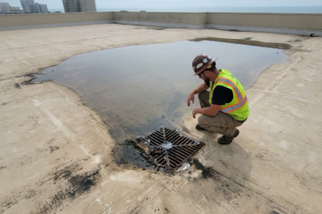 flat roof repair ponding water 