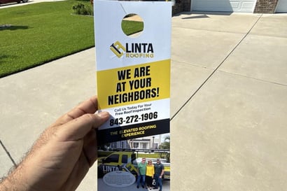 Linta Roofing door hanger reading We Are At Your Neighbors