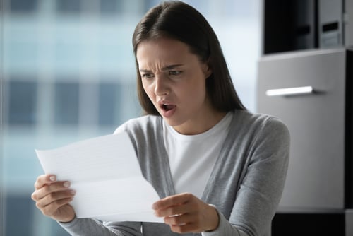 Homeowner upset to receive a letter in mail from her insurance company threatening to drop their coverage