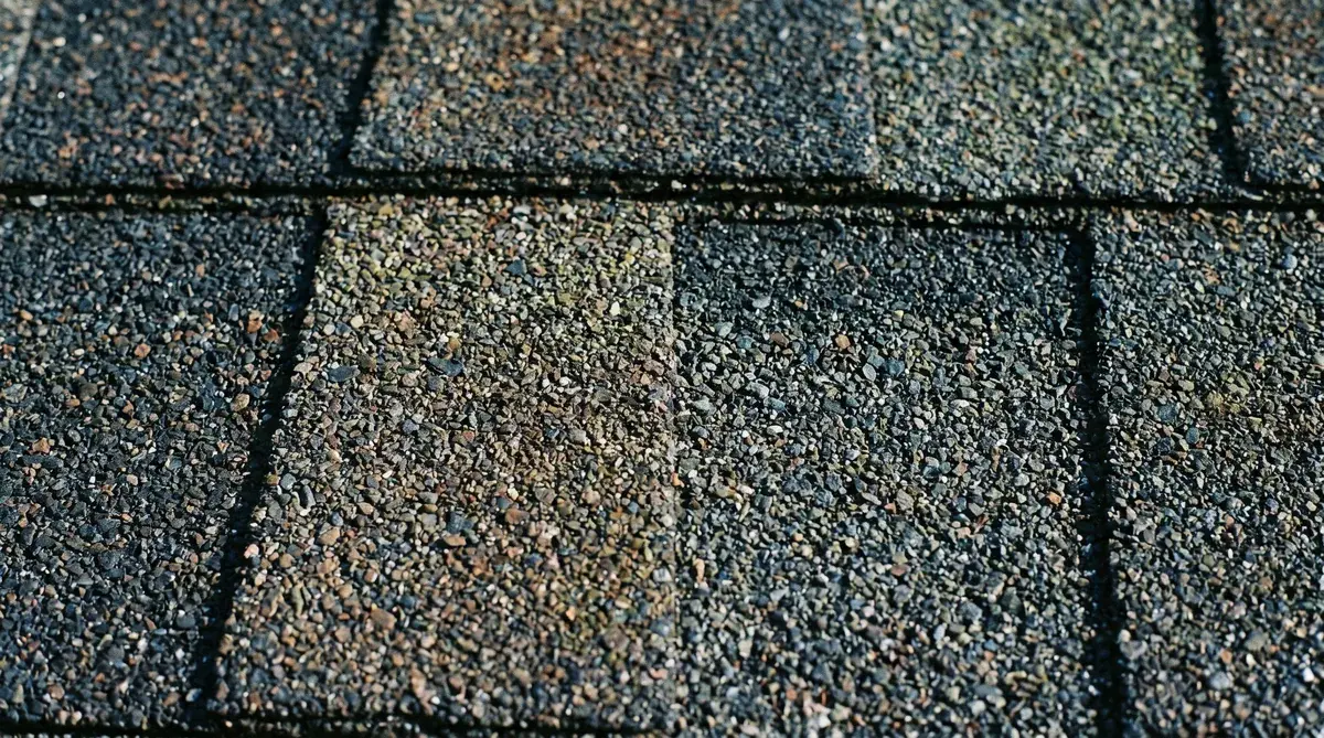 Close-up detailed view of architectural roofing shingle texture and color variations